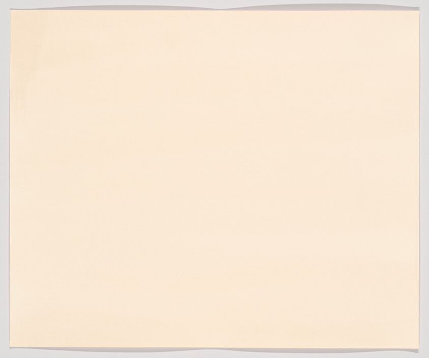 A blank piece of paper with a slight crease in the middle, set against a white background.