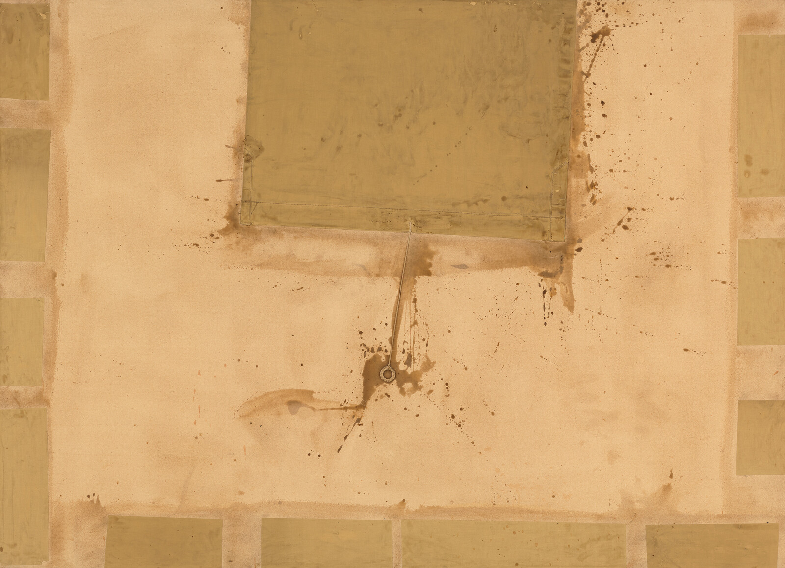 Ceiling panel with a central rusted sprinkler head, brown water stains, and rectangular patched areas.