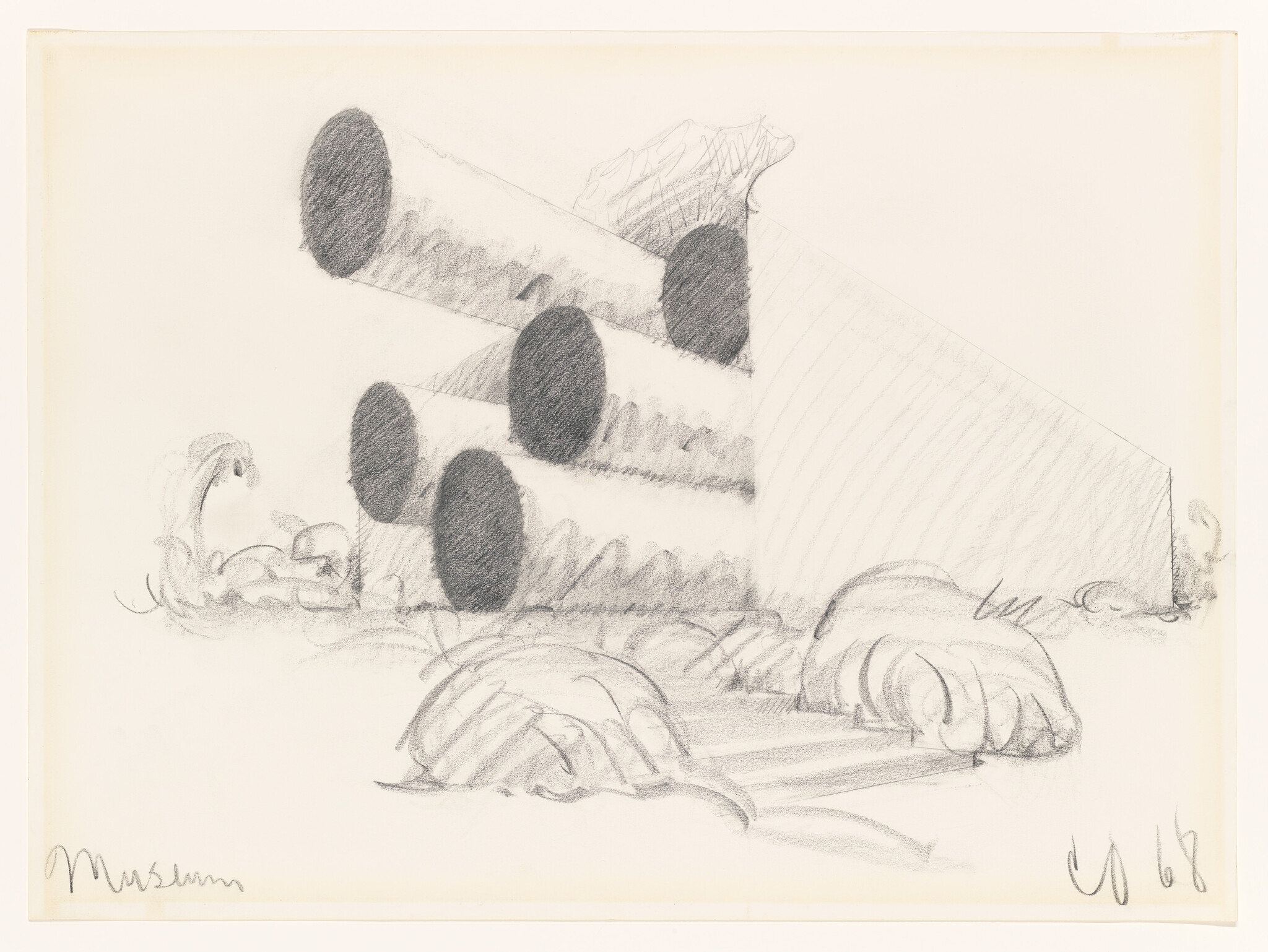 Stacked hollow concrete pipes arranged in a triangular pile near low bushes.