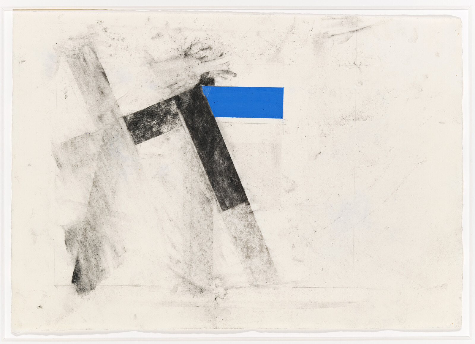 Two black smudged lines cross each other, with a solid blue rectangle near the top right intersection.