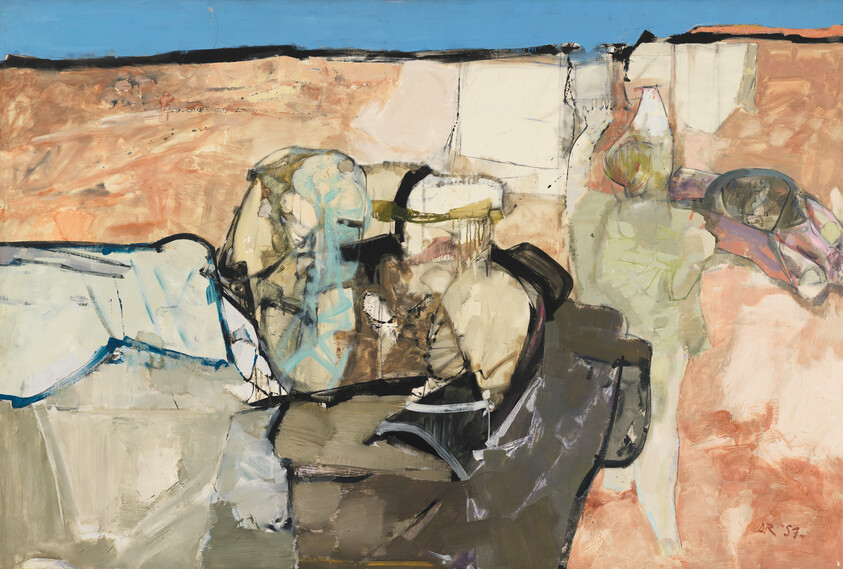 Two ceramic jugs and a bowl sit on a cluttered table against a pale textured background.