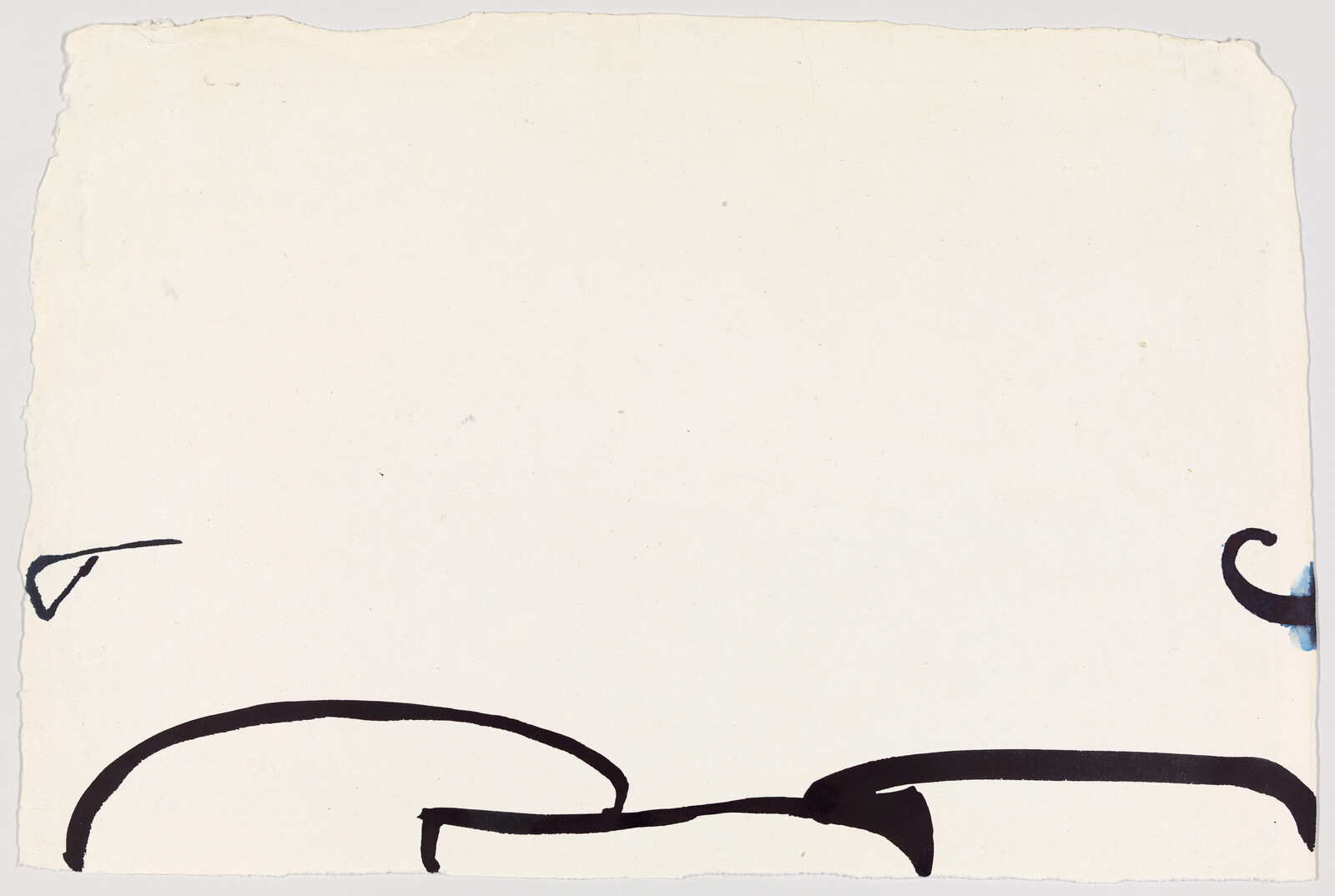 Blank off-white paper with bold black brush strokes and small ink marks along the bottom edges.