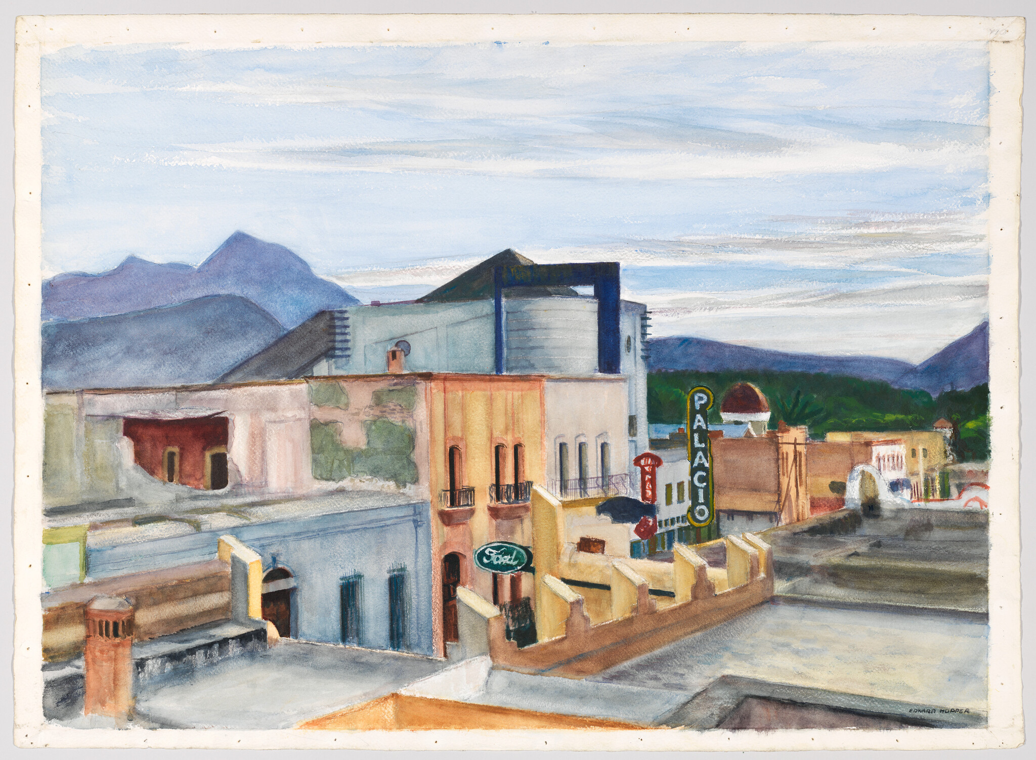 Downtown streets with colorful buildings, a vertical "PALACIO" theater sign, and distant mountains.