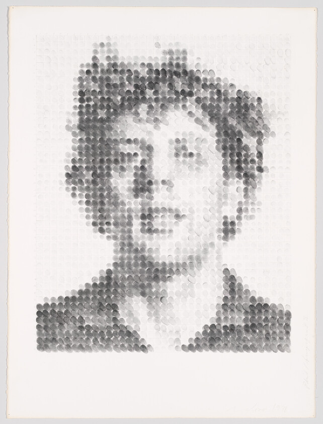 A grayscale portrait of a person formed from a grid of circular dots.