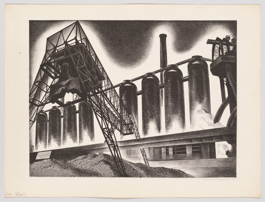 Steel mill with large storage silos and a towering loading crane over piles of raw material.