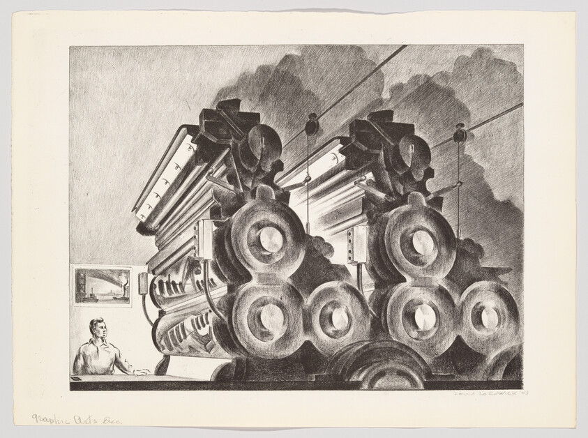 A worker standing beside massive industrial rollers of a printing press under overhead cables.