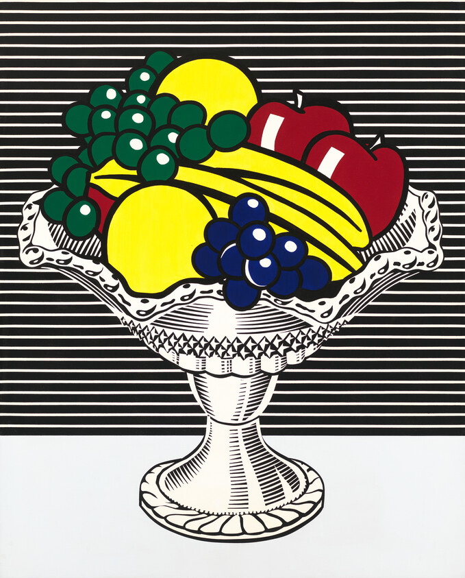 A colorful fruit bowl with bananas, apples, grapes, and lemons on a striped background.