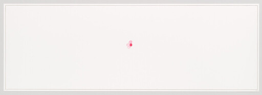 A small pink sticker sits near the center of a wide blank white panel.