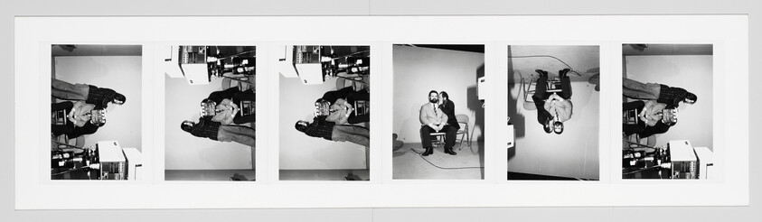 A panoramic sequence of four black and white photographs displayed side by side. Each photo is rotated 90 degrees from the previous one, creating a flipbook effect. The first and fourth images show a person standing and holding a complex piece of equipment with dials and wires. The second and third images, rotated 180 degrees from the first, depict two individuals sitting, one of whom is wearing headphones and appears to be conducting an interview or recording. The setting includes electronic equipment and a plain backdrop, suggesting a studio environment.