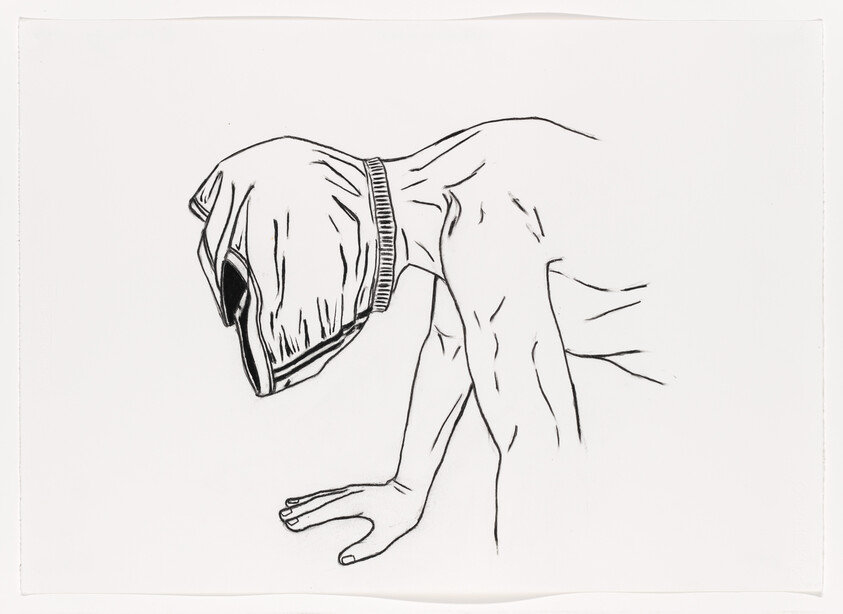 Person on hands and knees with a cloth hood covering their head.