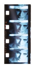 Vertical filmstrip shows three blue-tinted close-up frames of a person's contemplative face.