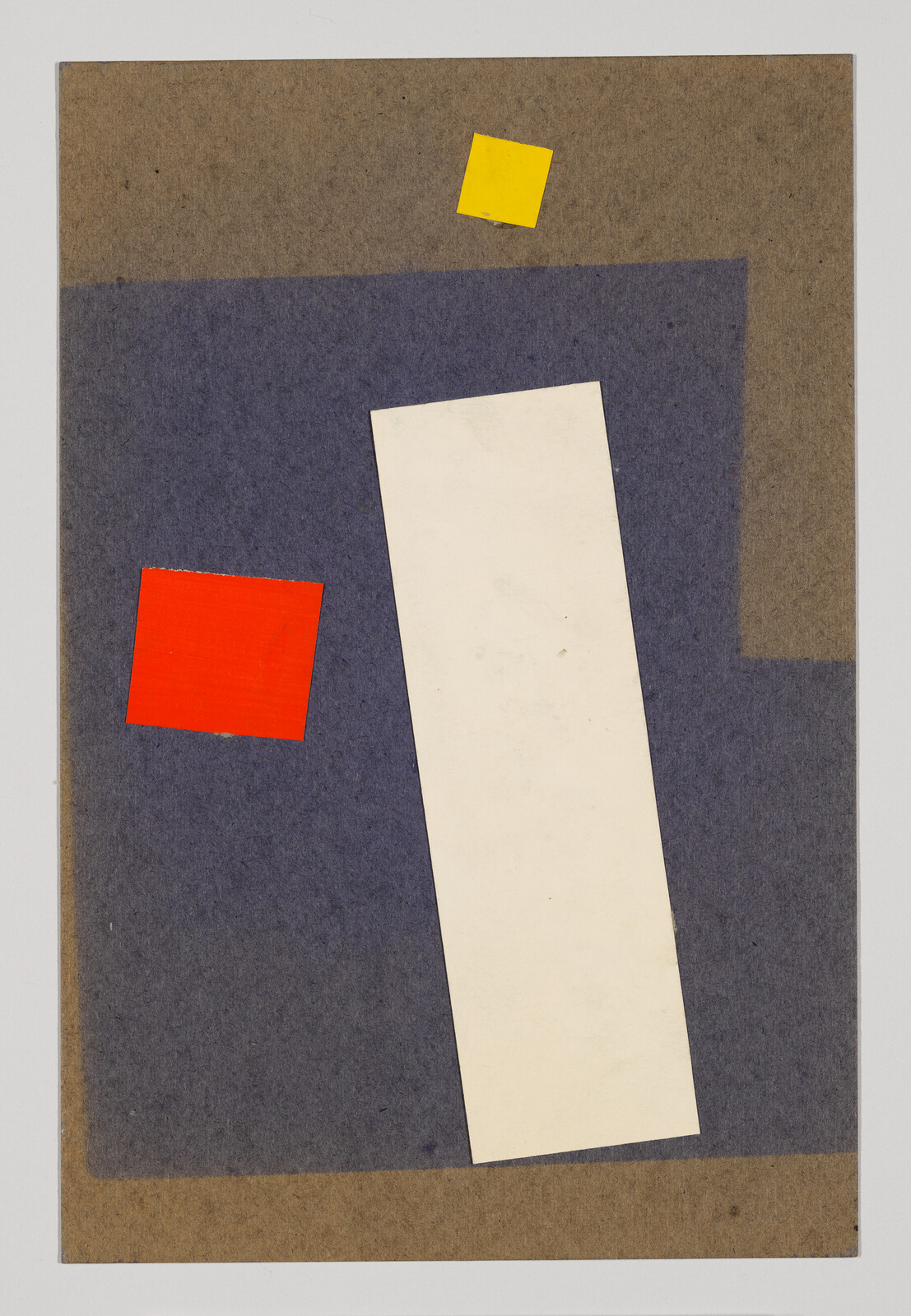 A tilted white rectangle beside a red square and a small yellow square on a blue-brown background.