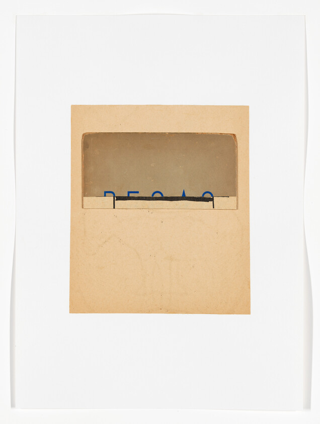 Brown paper artwork with rectangular window showing partially obscured blue letters and a black strip.