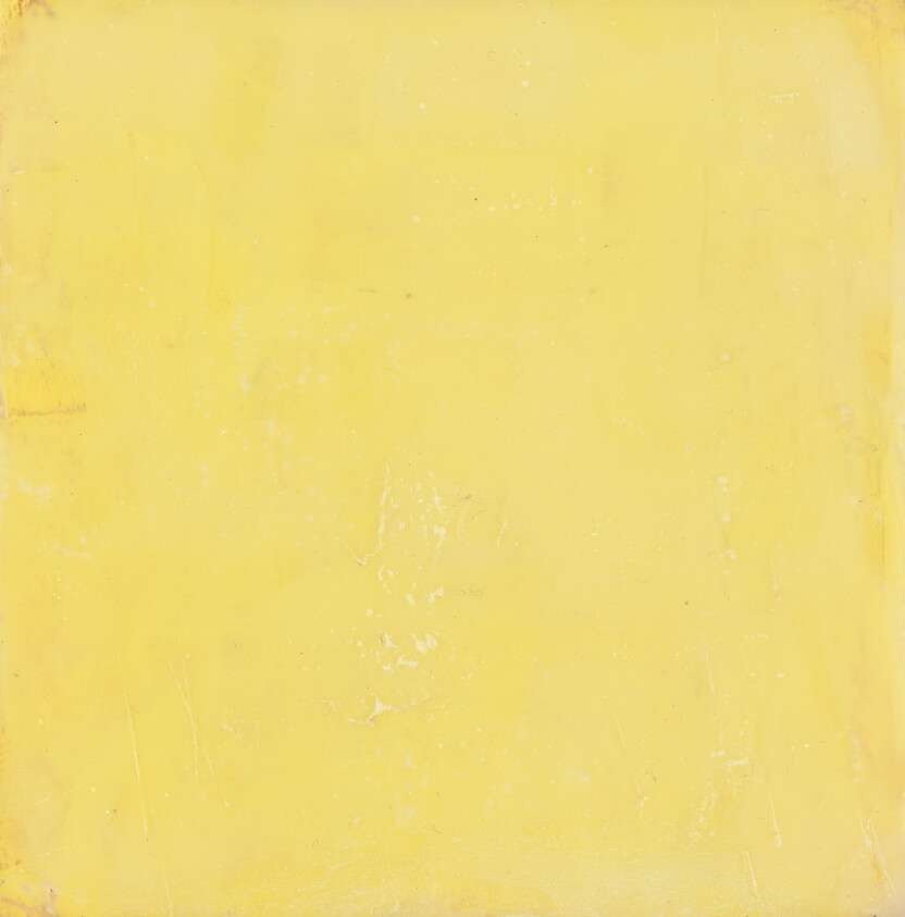 A worn pale yellow textured square background with faint scratches and subtle color variations.