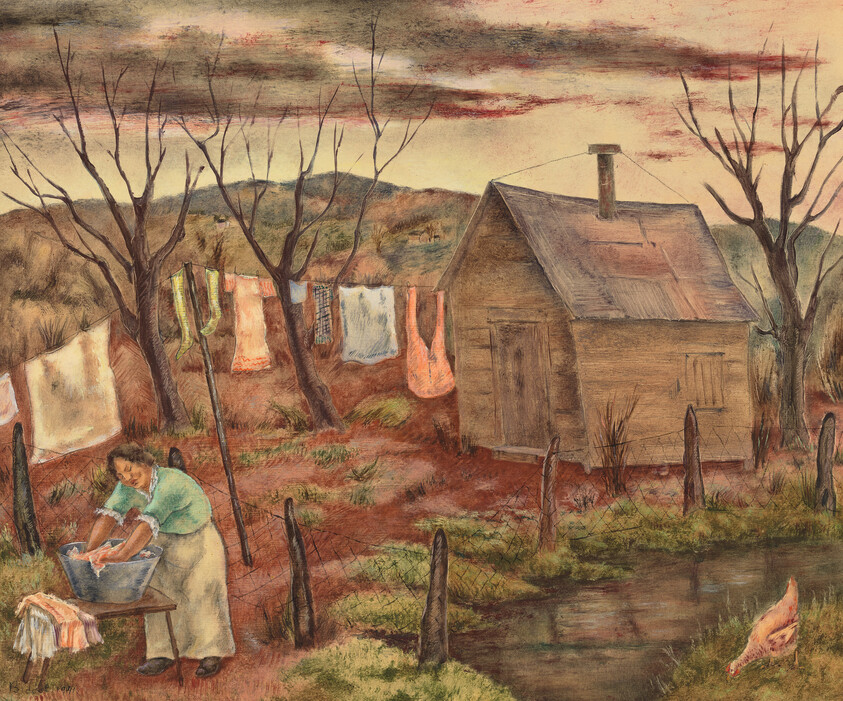 A woman hand-washing clothes at a basin beside a clothesline near a small wooden shack and pond.