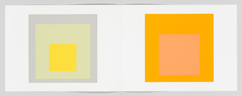 Open book with two pages showing abstract art of concentric squares in pastel colors.