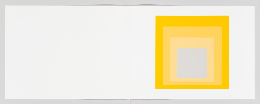 An open white booklet shows nested yellow and orange square shapes on the right page.