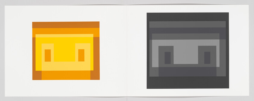Two square geometric face designs, one bright yellow-orange and the other grayscale, displayed side by side.