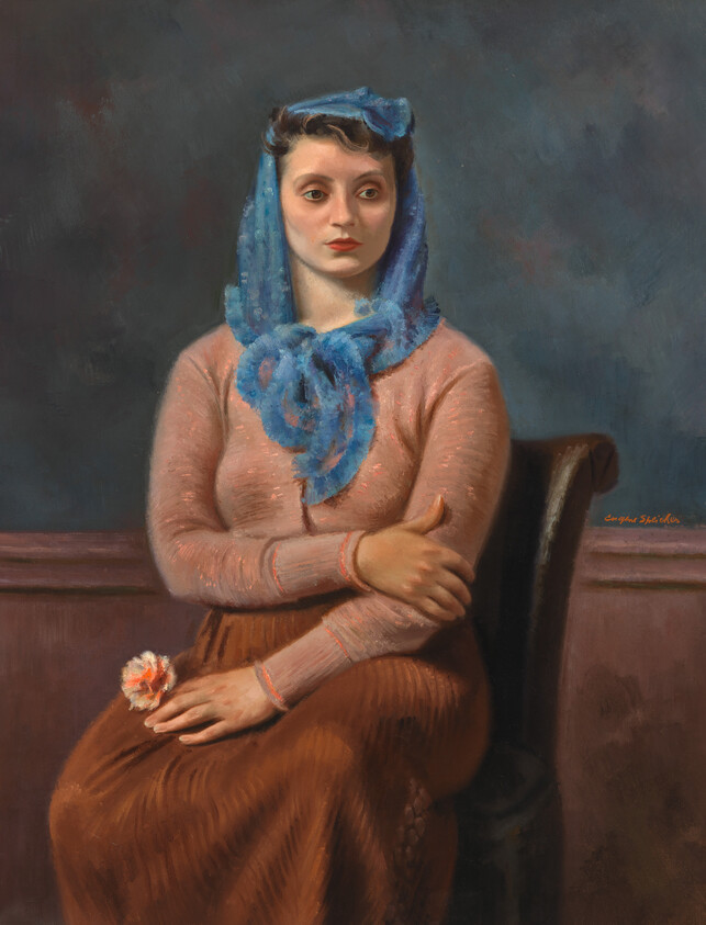A seated woman wearing a blue headscarf and pink sweater holds a small white and pink flower.