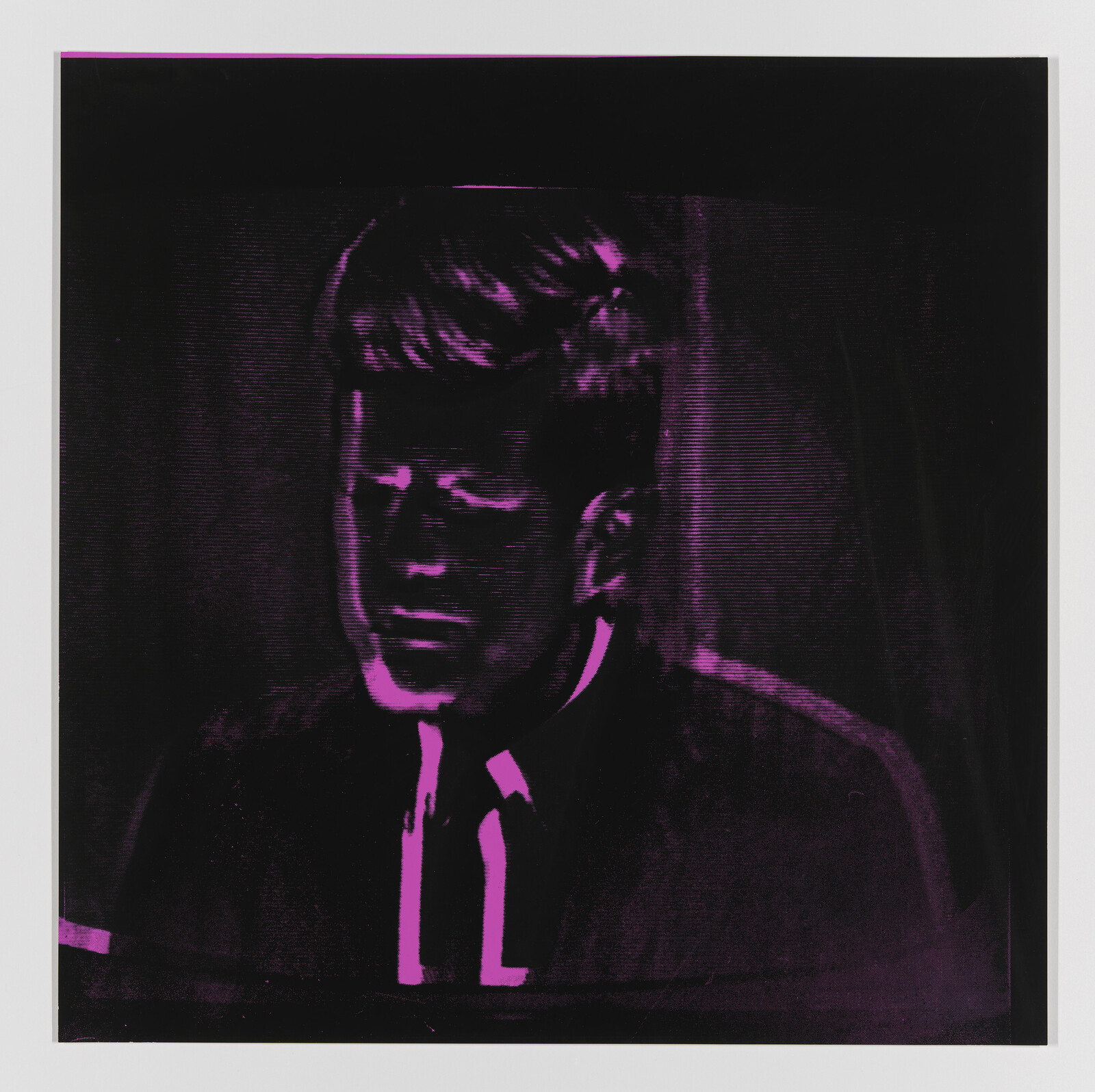 A stylized portrait of a man in high contrast with a predominantly purple hue, reminiscent of pop art techniques. The subject is depicted in a side profile with a serious expression.