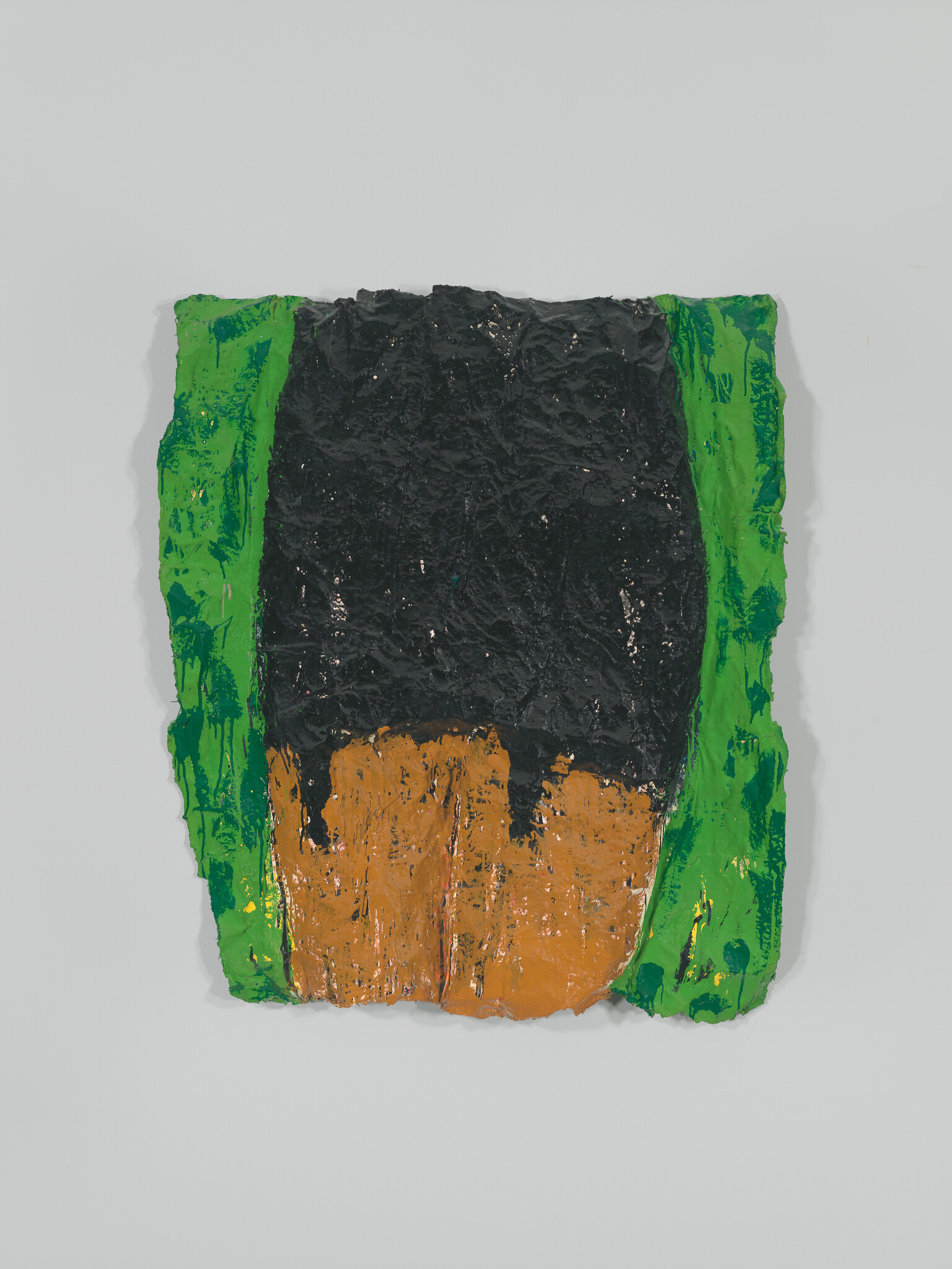 Thick textured abstract painting with a large black center, brown base, and bright green sides.