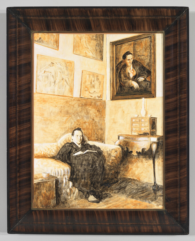 A woman in a dark dress sits on a sofa reading a book in a warmly lit room.