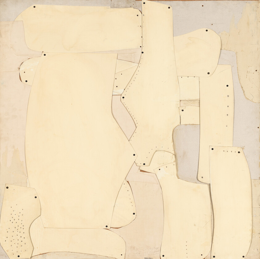 Layered beige paper pattern pieces with small punched holes arranged on a neutral background.