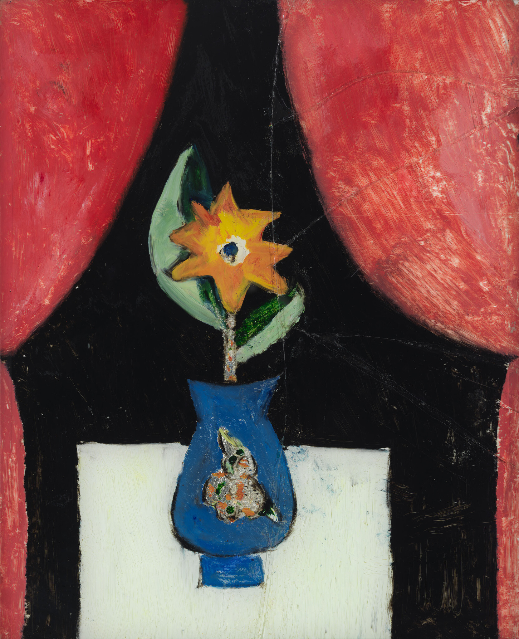 A yellow star-shaped flower grows in a blue vase on a white table with red curtains.