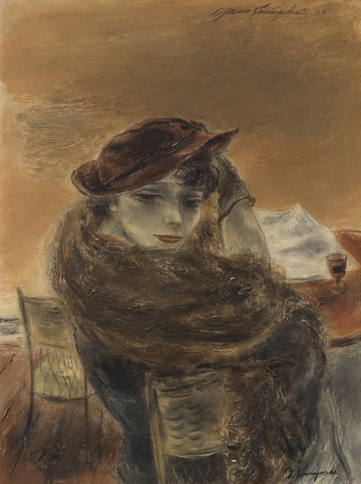 A woman in a brown hat and fur wrap looks back while seated at a café table.