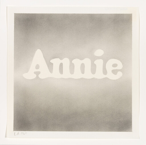 Large white word "Annie" centered on a soft gray square background.