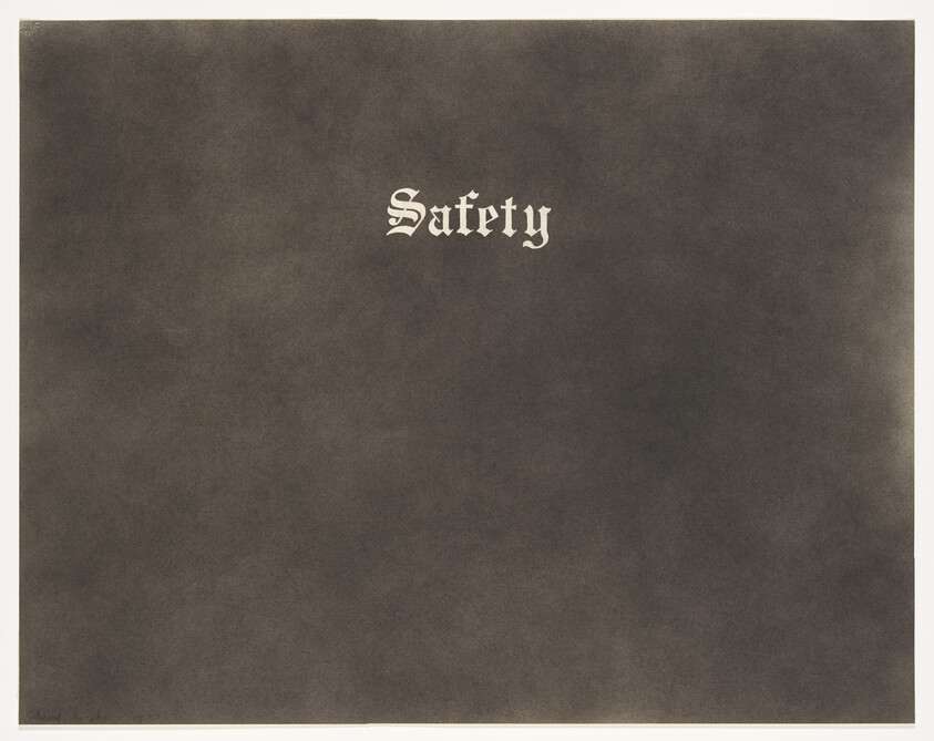 The word "Safety" appears in ornate white type centered on a dark gray background.
