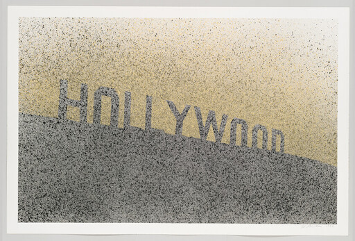 The Hollywood sign letters stand atop a speckled hillside under a pale sky.