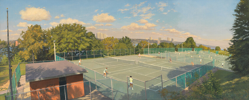 Several people play tennis on multiple outdoor courts surrounded by trees and a distant city skyline.
