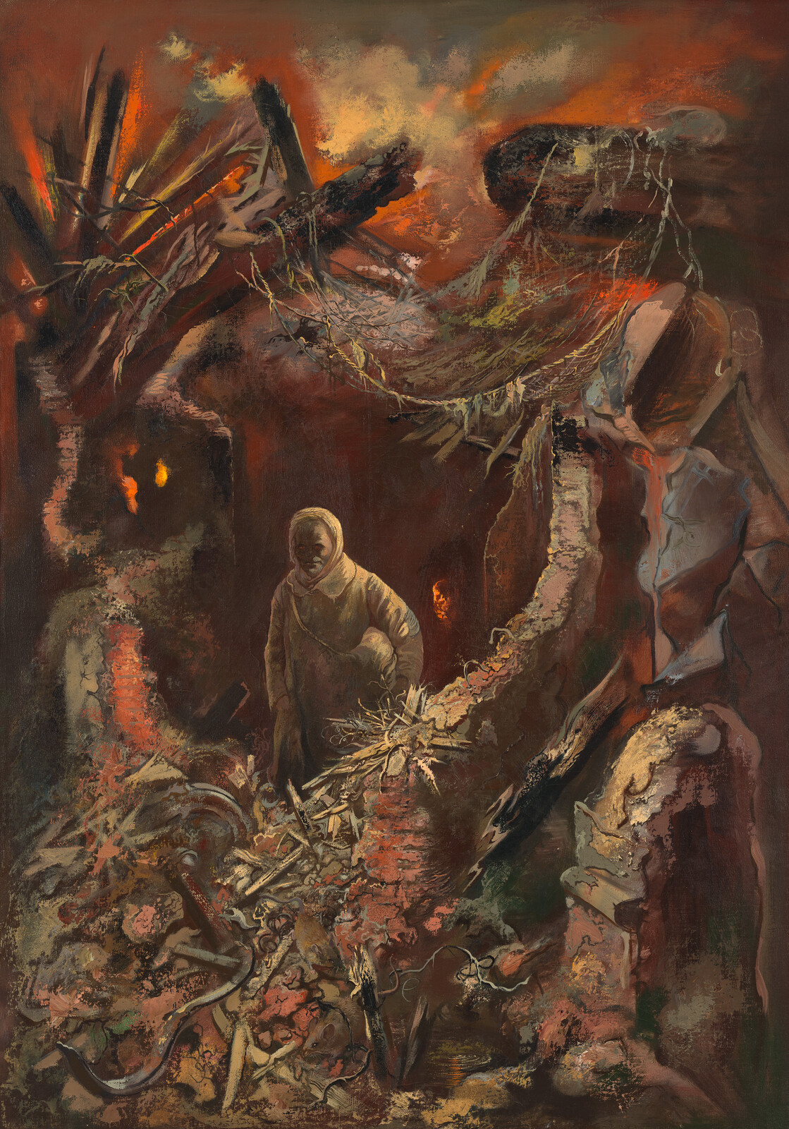 A cloaked figure searches through rubble and bones in a dark, fiery ruined landscape.