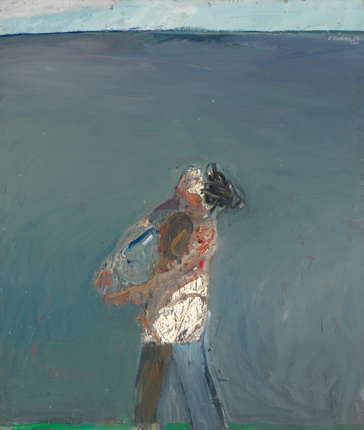 A person carries a child on their shoulder against a wide muted blue background.