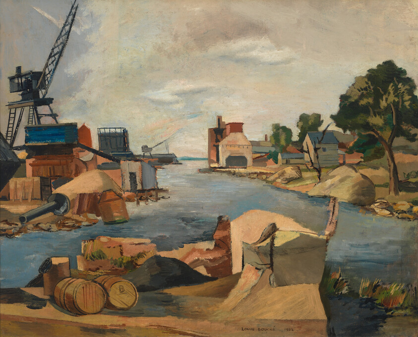 A quiet industrial harbor with a crane, barrels on the shore, and factory buildings across the water.