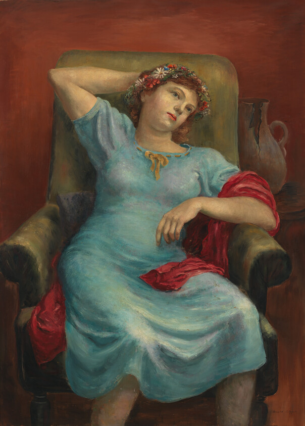 A woman in a blue dress and flower crown reclines wearily in an armchair with a red shawl.