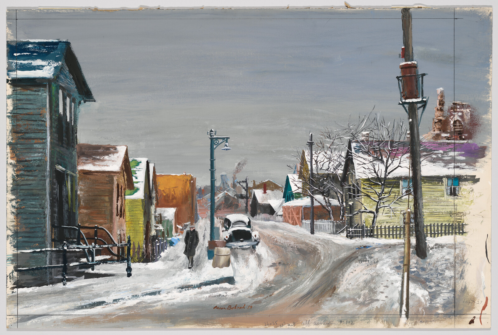 A lone pedestrian walks down a snowy street past houses and a car with its trunk open.