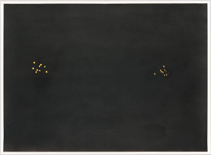 Two small clusters of yellow dots appear against a large dark black background.