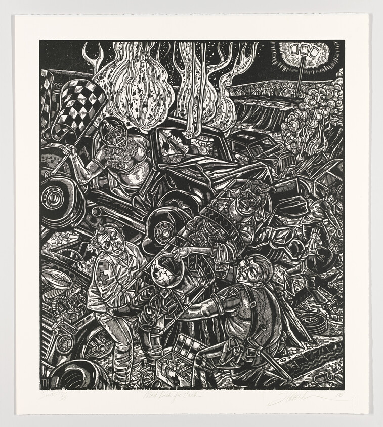 A detailed black and white linocut print depicting a chaotic scene of piled-up cars and motorcycle parts with three figures in racing gear among the debris. One figure waves a checkered flag, another sprawls across a tire, and the third stands with hands on hips. Flames and smoke rise in the background, and a race track with a cheering crowd is visible in the upper right corner. The artwork is signed by the artist.
