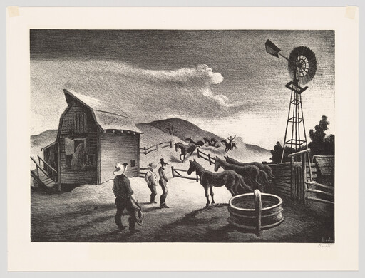 Cowboys watch horses being rounded up near a barn and windmill at dusk.
