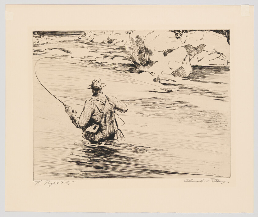 A man wading in a river casts a fly fishing line toward rocky riverbanks.