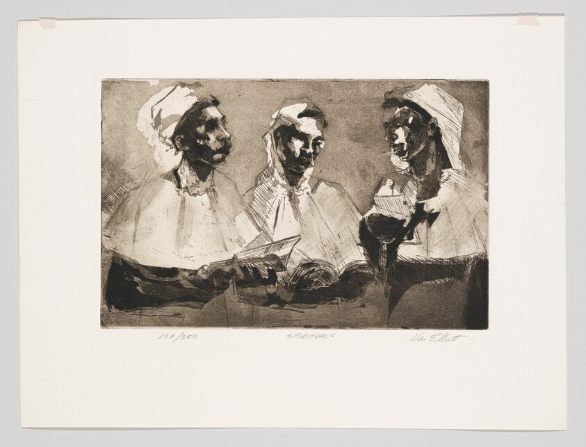 Three women in head scarves sit together reading from books and singing.
