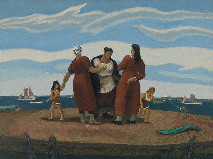 Three women in long dresses talk on a seaside shore while children play near boats.