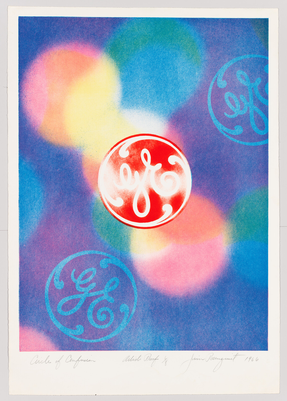 A colorful abstract artwork featuring a prominent red circle with a white stylized script logo in the center, surrounded by soft, overlapping pastel hues of blue, yellow, and pink. The background has faint impressions of the same logo in blue. Below the image, there is handwritten text and signatures.