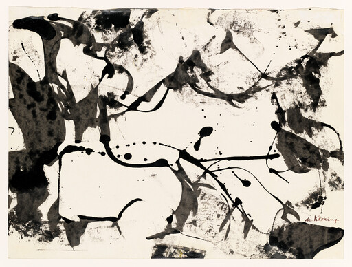 Black ink splatters and flowing brushstrokes spread across a white sheet in abstract patterns.