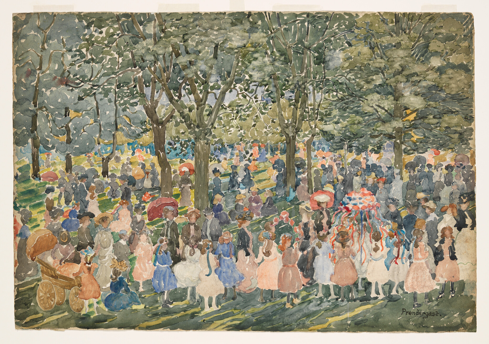 Children and families gather under trees for a festive outdoor celebration with ribbons and parasols.