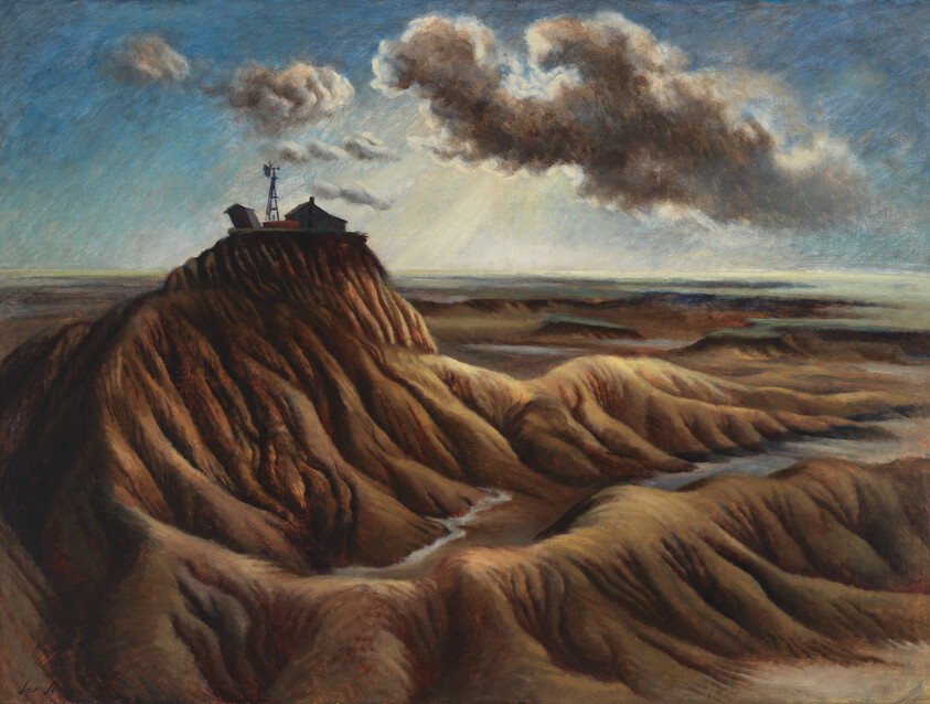 A lone house and windmill sit atop a steep, eroded butte under dramatic clouds.