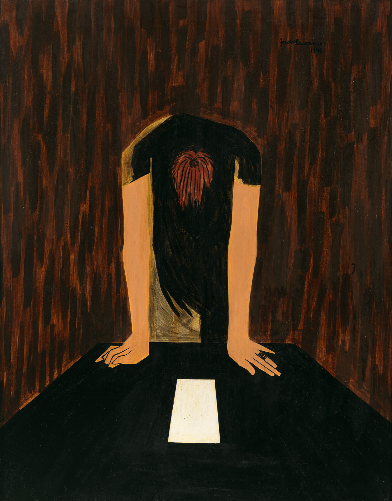 Person leans over a table with a white paper, surrounded by a dark, textured background.