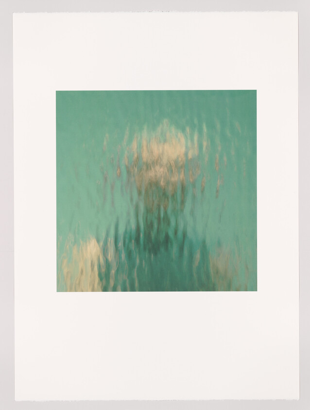 Blurred human silhouette seen through rippled glass or water, creating vertical waviness.